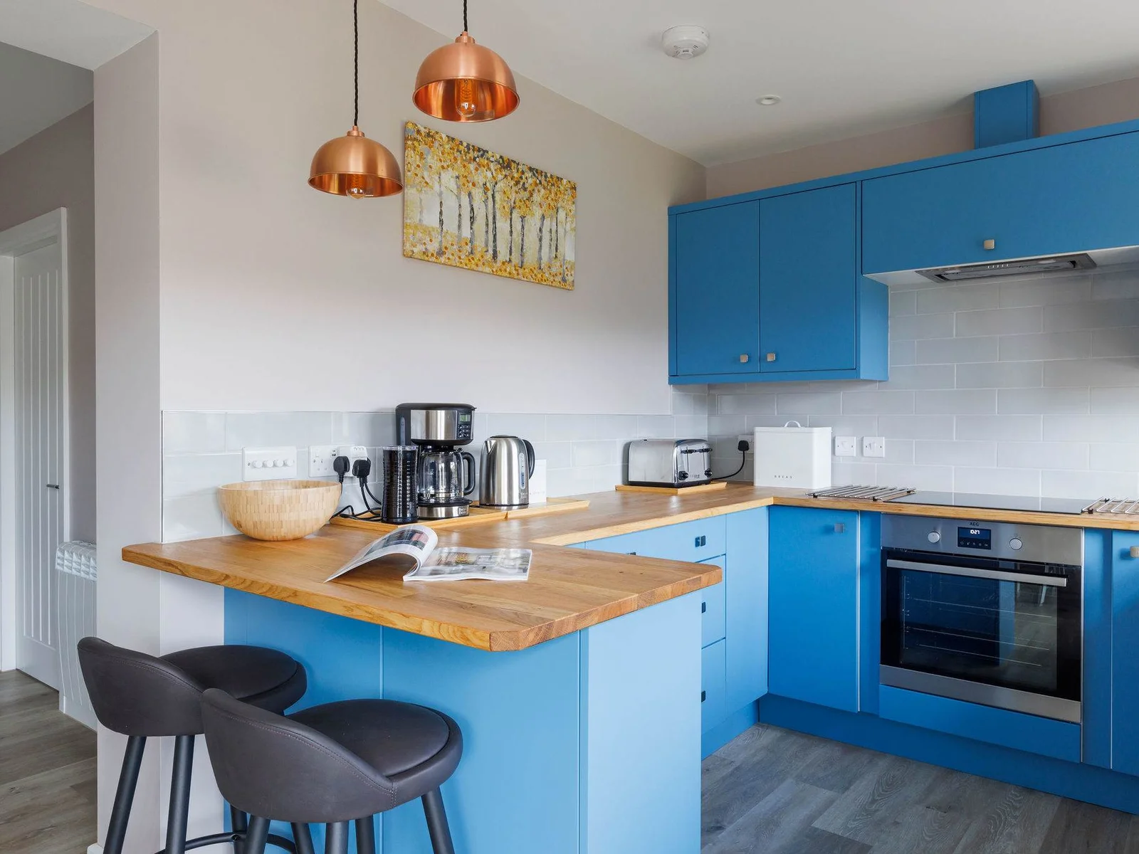 The fully equipped kitchen has all the modern amenities you need to prepare meals for family and friends.