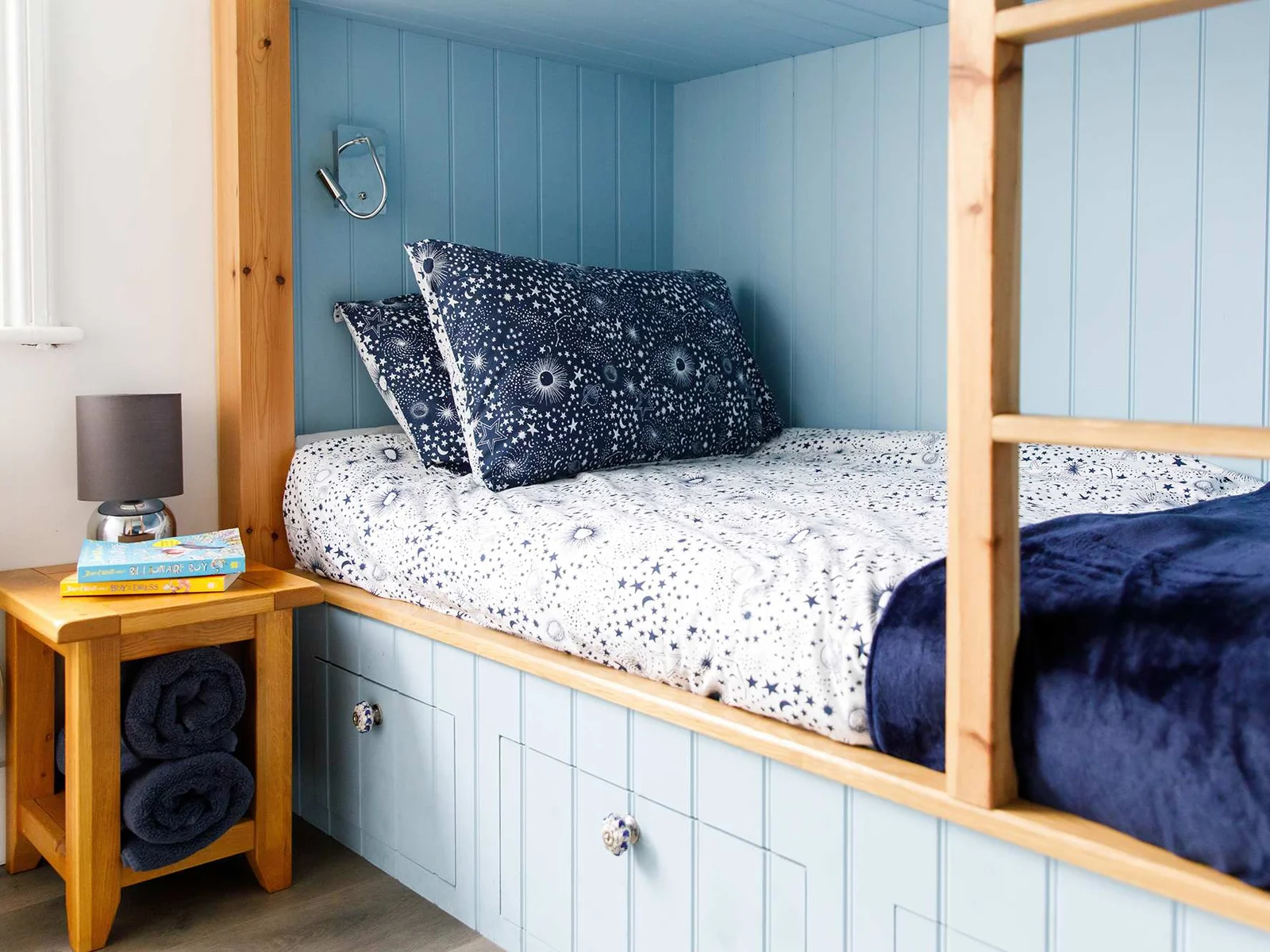 Comfy cushions and bed throws are found in all bedrooms.