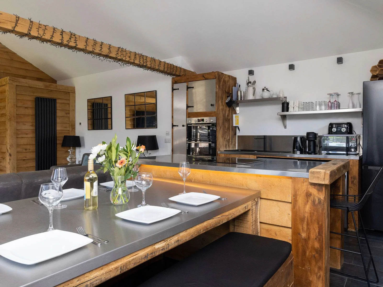 Entertain easily in this striking, fully-equipped modern kitchen and inviting dining area.