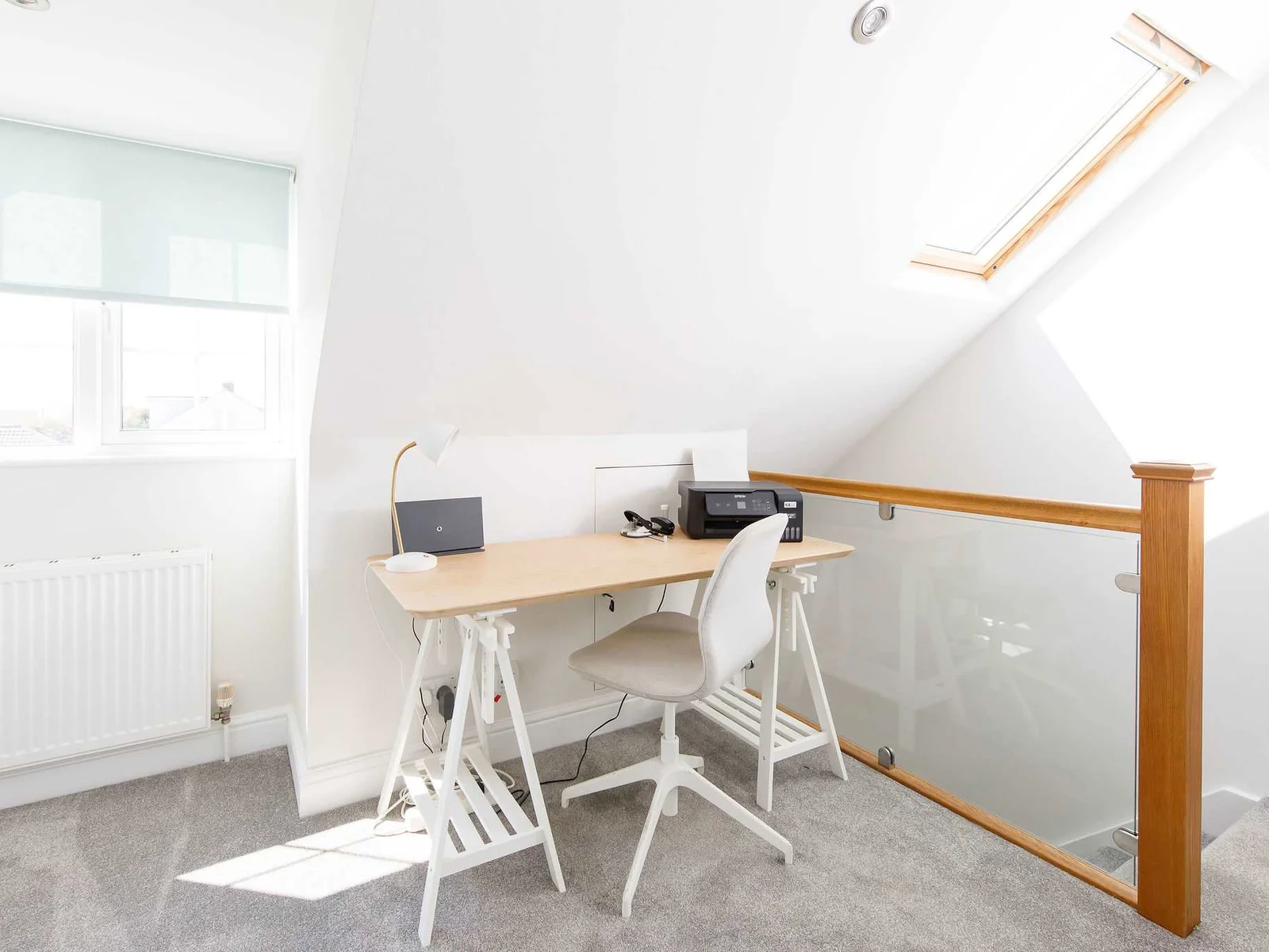 This dedicated work space on the landing is ideal for those needing to work or study remotely.