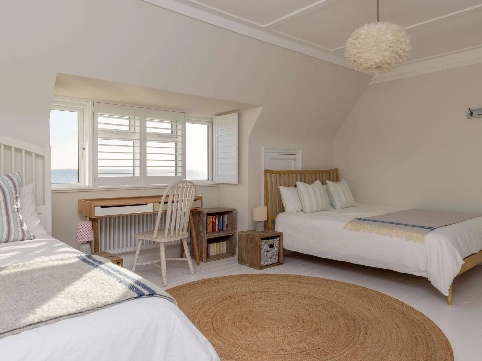 Spacious twin room with sea views.