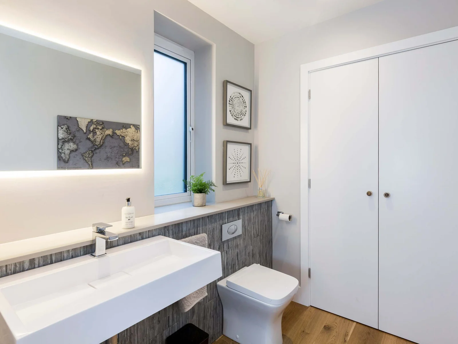 Get ready to go out in one of three stylish bathrooms.
