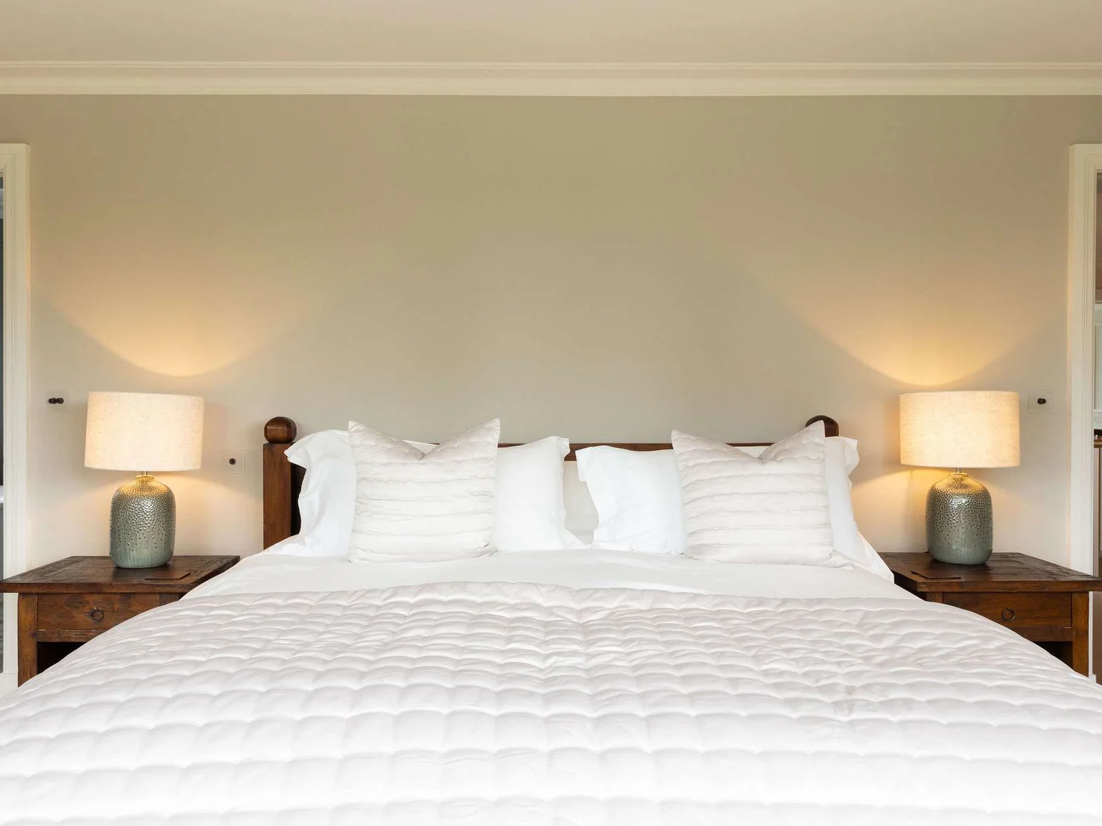 Calming bedroom with super king bed and crisp white bedding