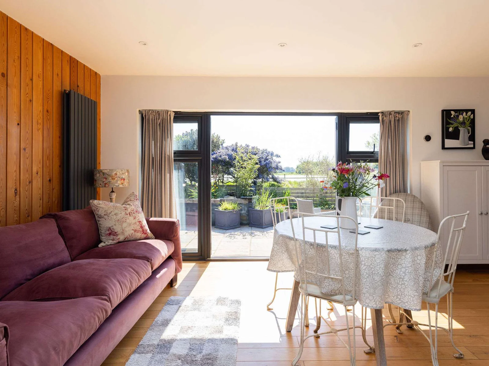 Open up the patio doors on warmer days and let the breeze in.