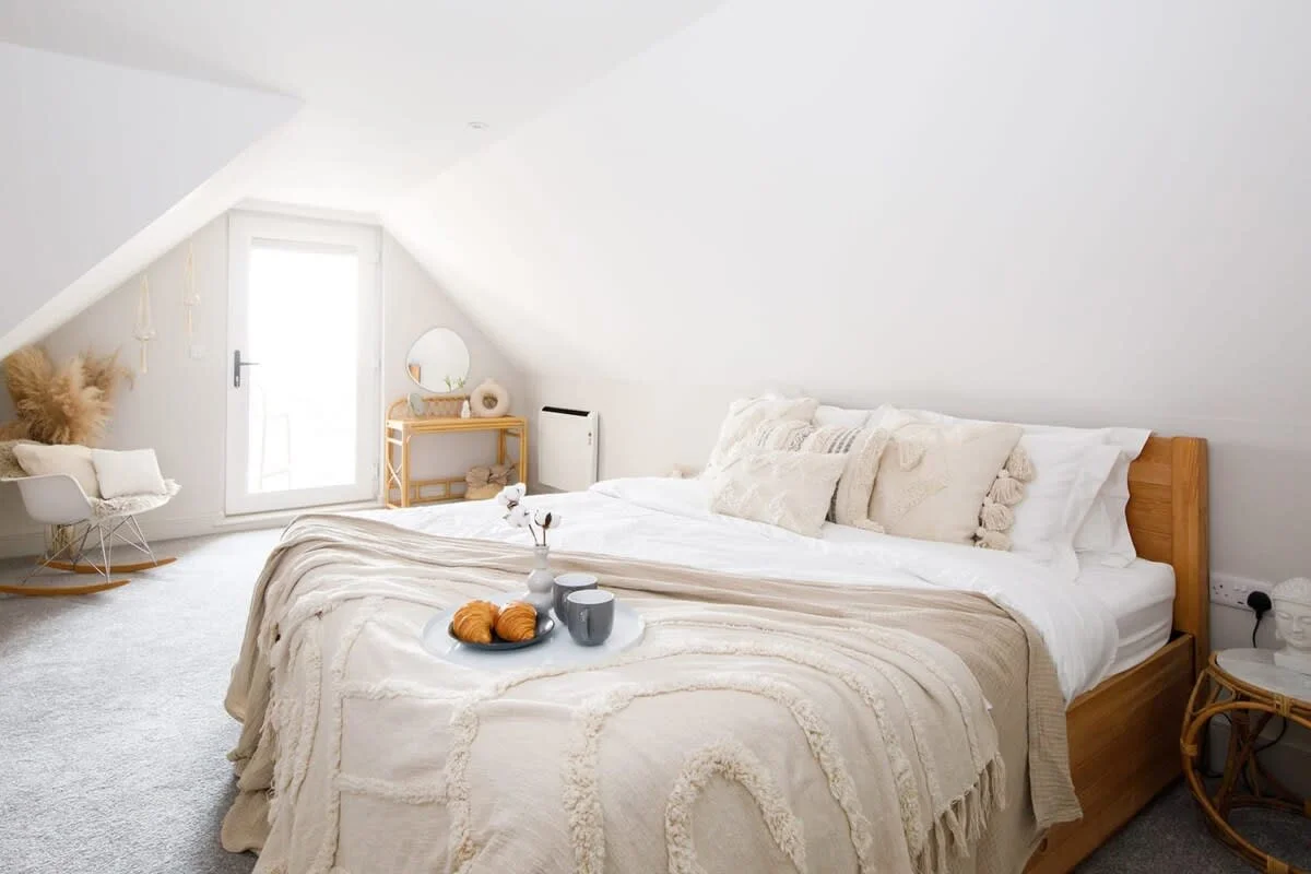 Enjoy luxurious linen and comfy pillows (maybe even breakfast in bed) in the master bedroom.