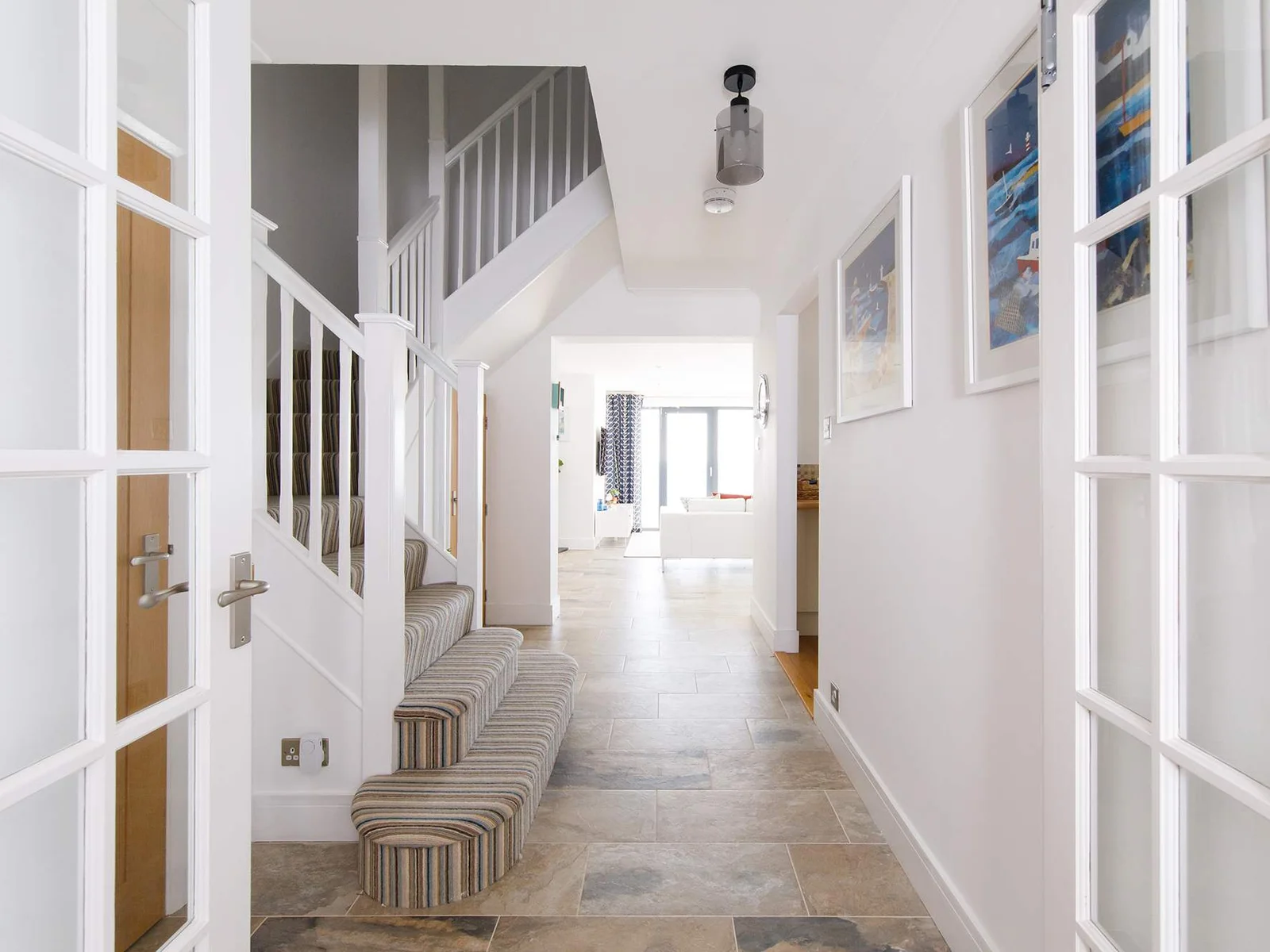 The house is light and spacious, with modern interiors.