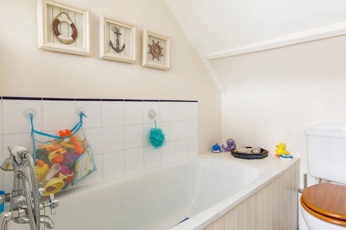 There is a handy bathoom between the children's rooms.