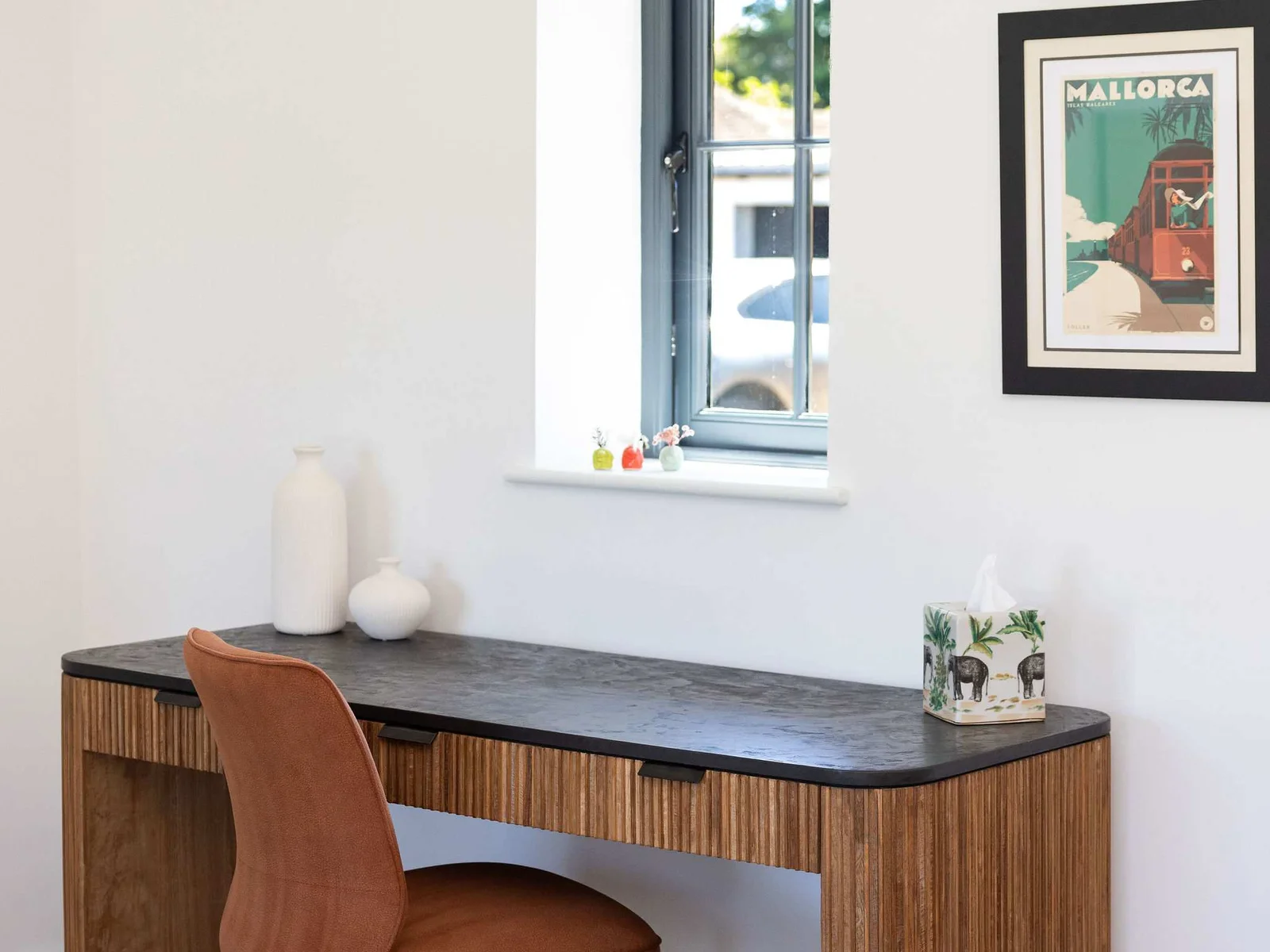 Work or write peacefully at a dedicated desk, with natural light and relaxed lodge comfort nearby.