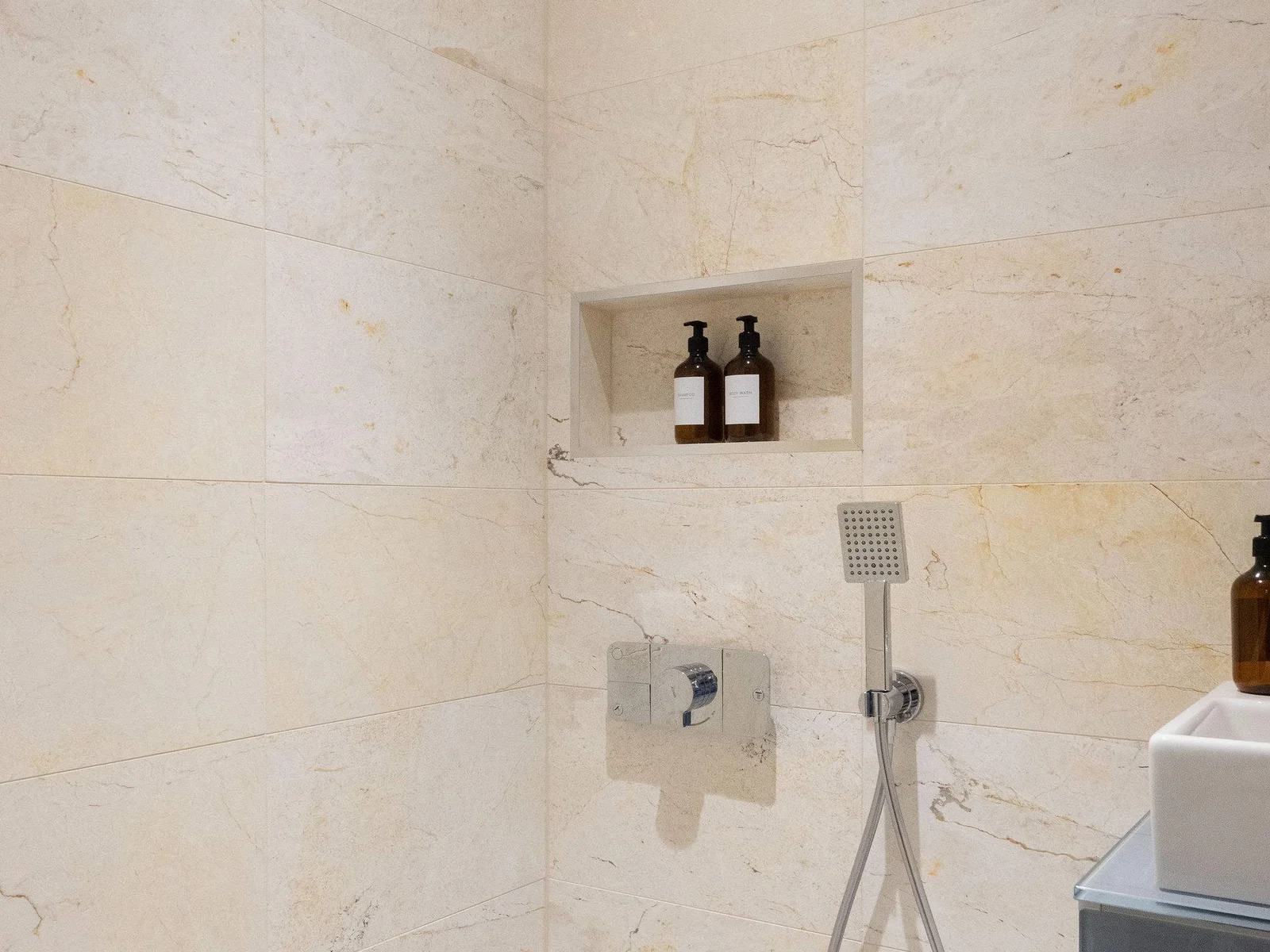 Bedroom 4- A small shower room with handheld shower accompanies this bathroom.