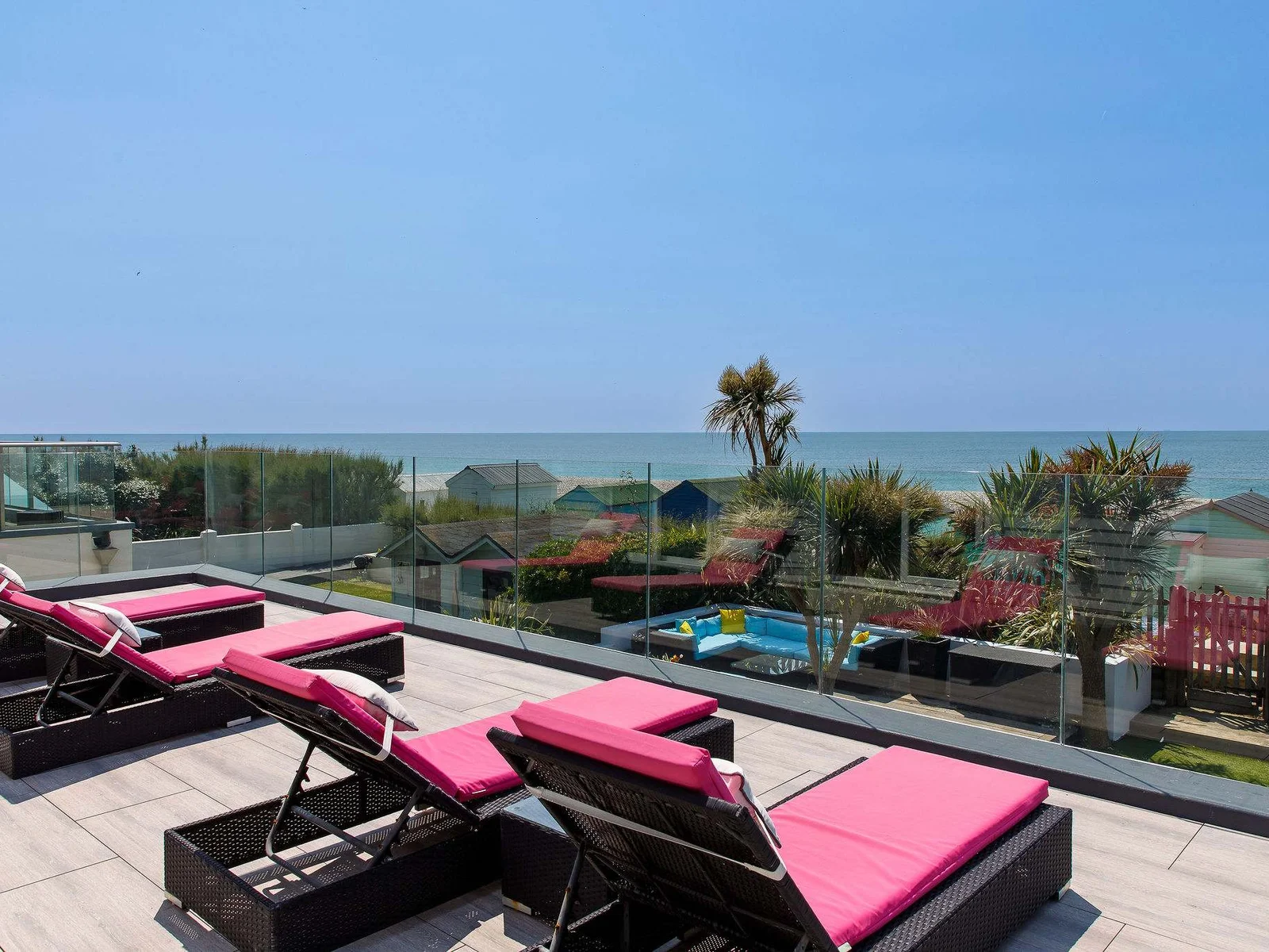 Soak up the sun on the balcony as you enjoy sea views.