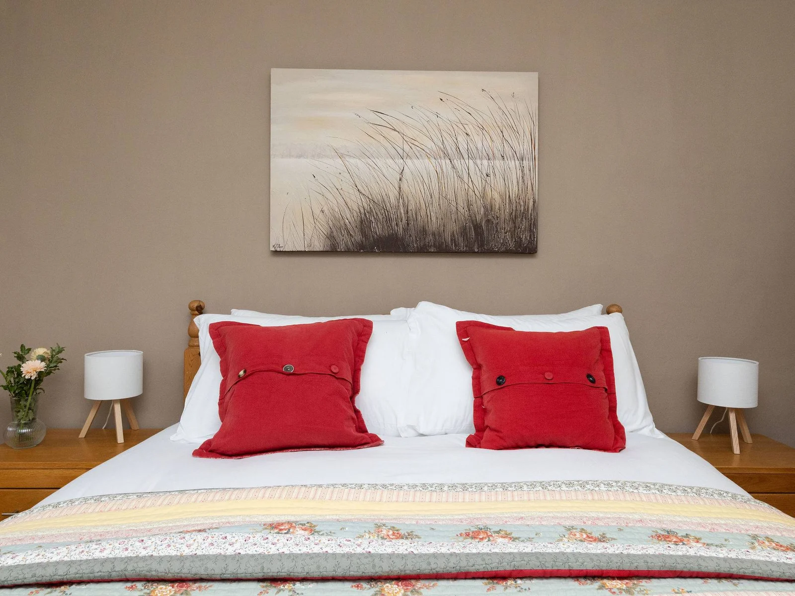 Sink into the comfy king bed with fresh white linens for a restful night's sleep.