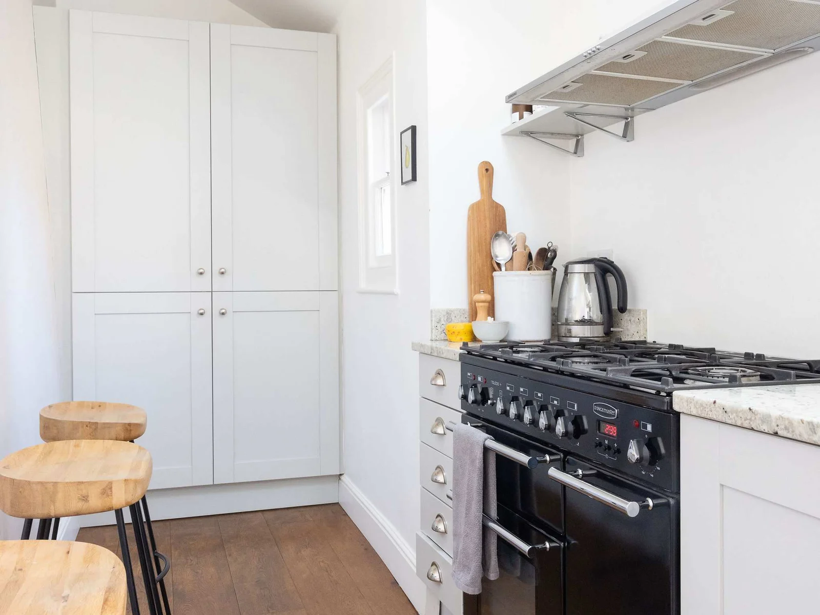Spacious kitchen featuring a classic range cooker