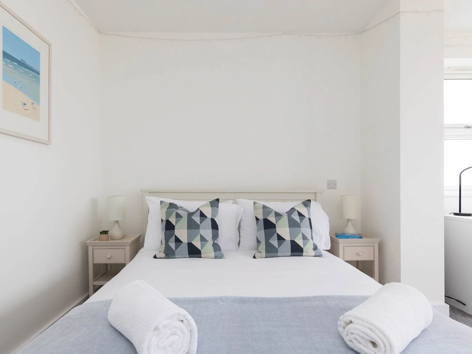 A serene coastal bedroom designed for total relaxation