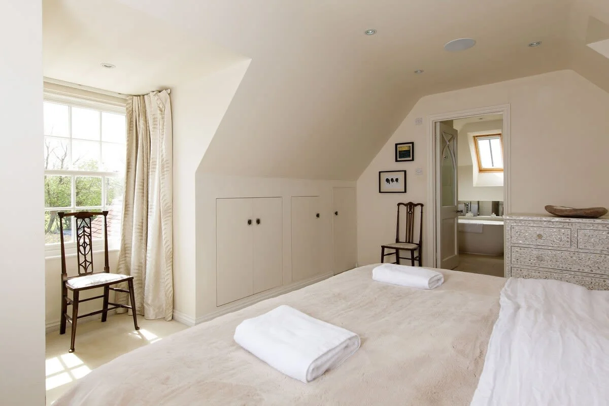 Natural calm decor ensures a restful bedroom to retreat to at the end of the day.