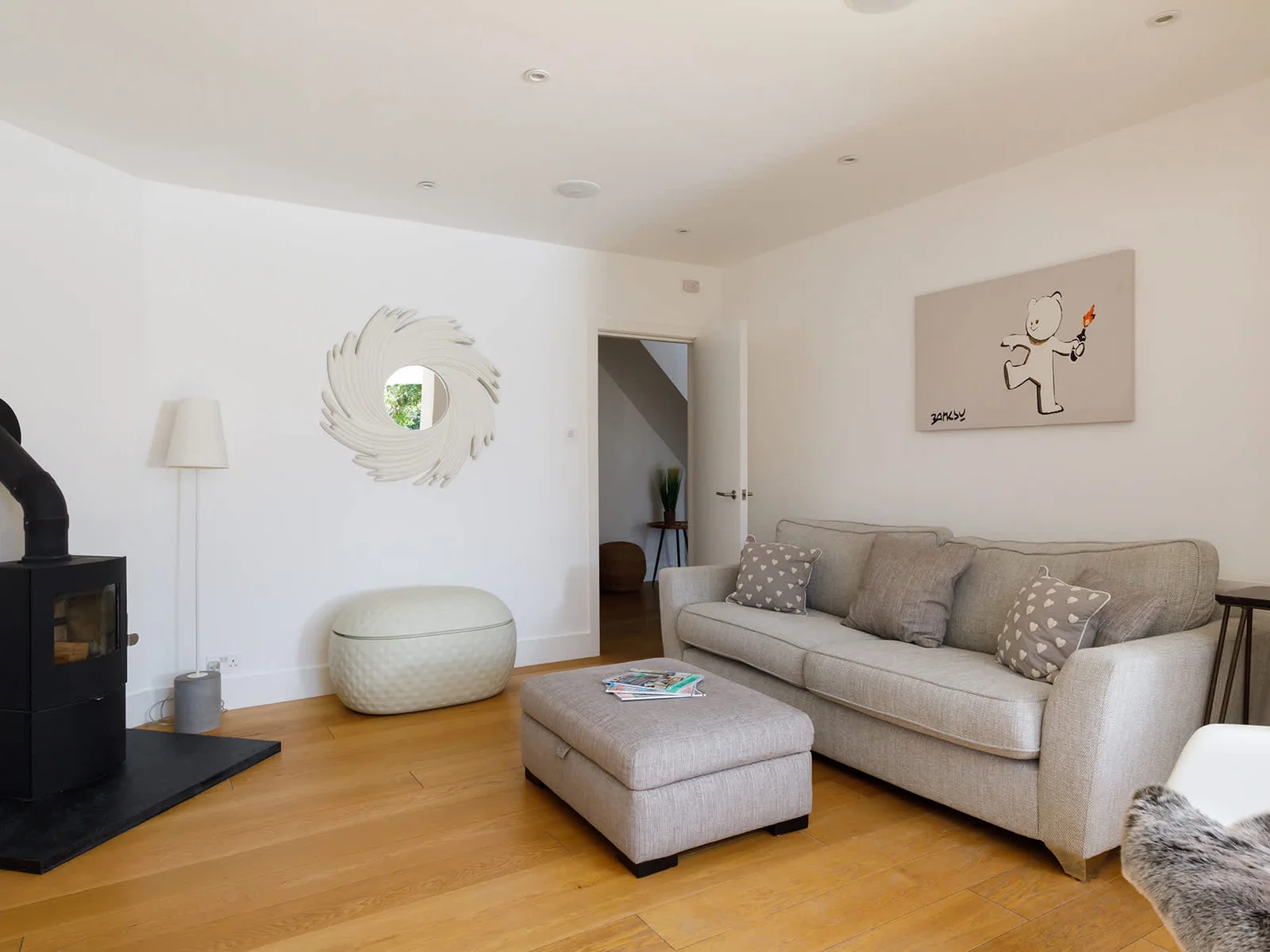 The open floor plan is more suitable for reading as you won’t be disturbed by the action in the central part of the living area