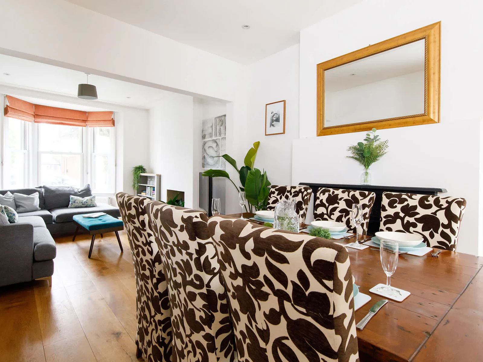 A beautiful dining area sits just off the cozy lounge area.