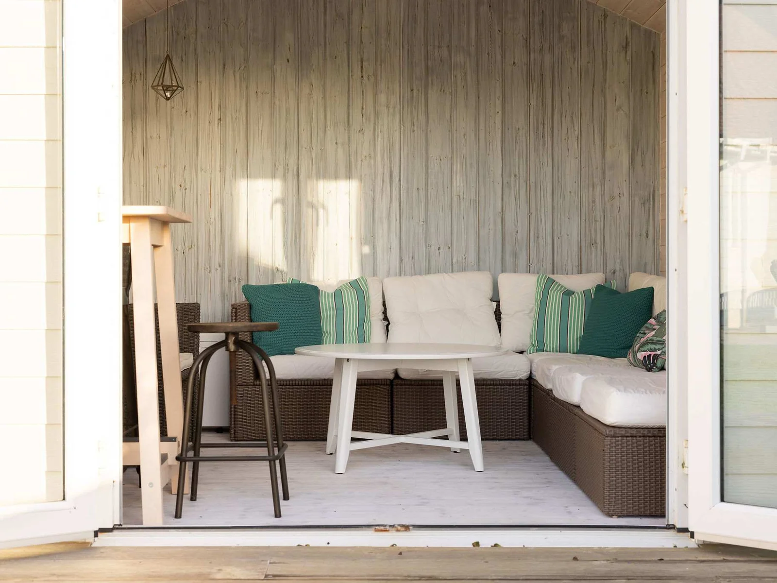 Enjoy the garden summer house with seating.