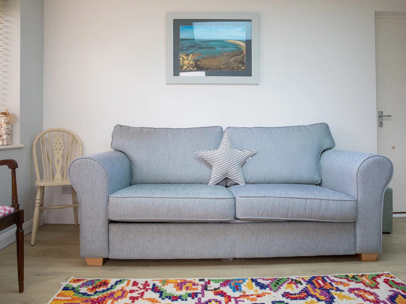 This lovely sofa is placed within the play area