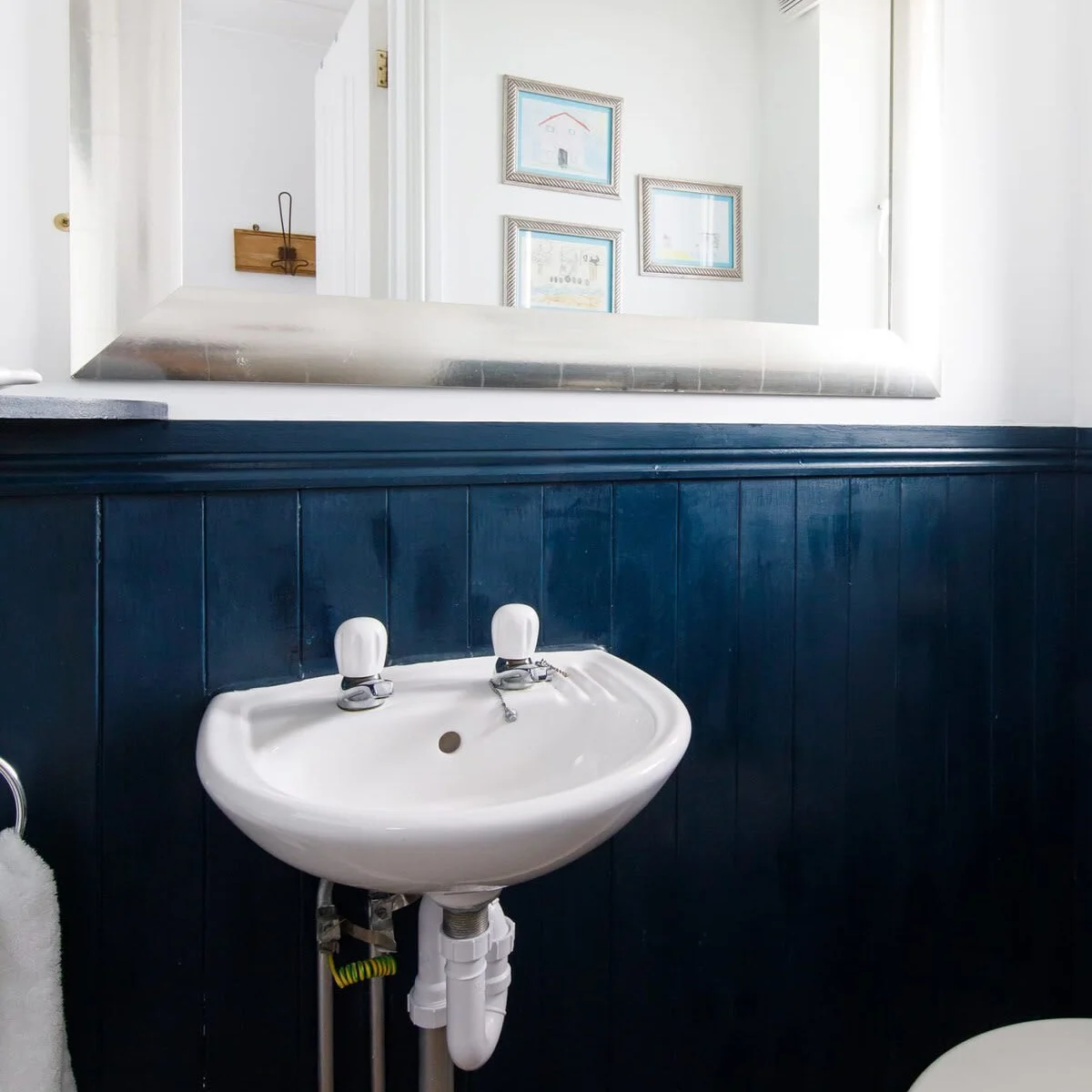 You'll find a handy downstairs cloakroom.
