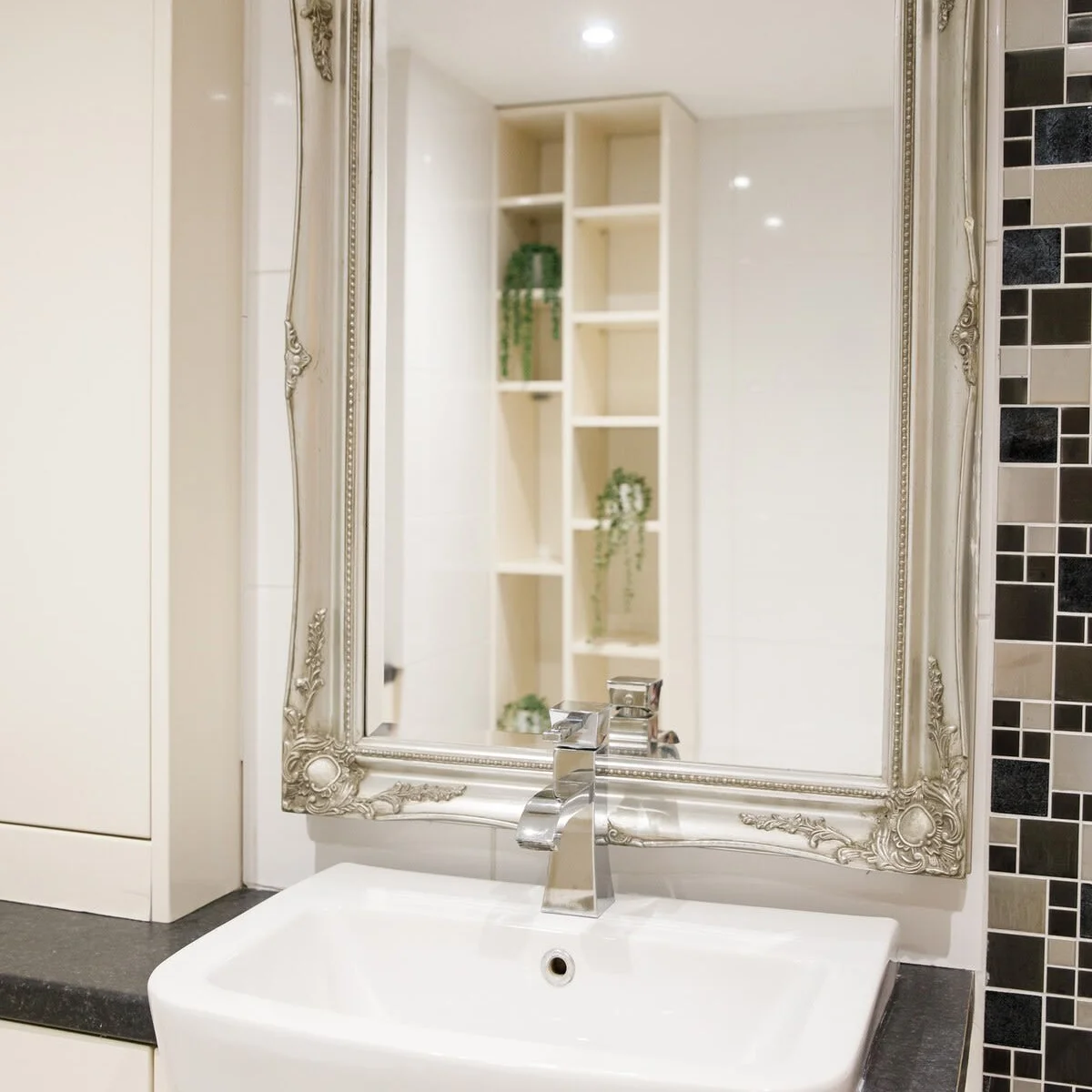 Bathroom with sink, bath, shower and toilet.