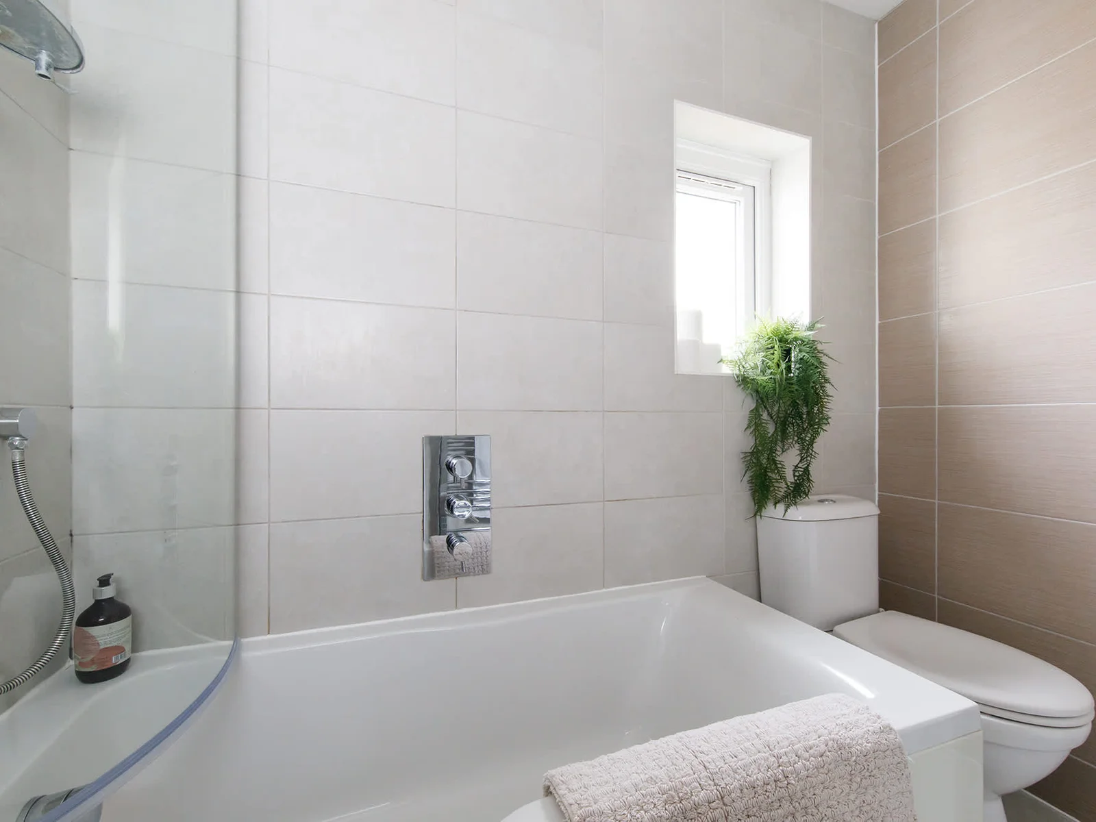 Take a long soak in the bath after a fun filled day spent by the seaside.