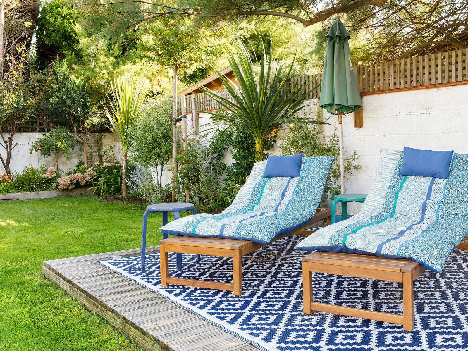 The home has a spacious private garden with seating areas, BBQ and trampoline, which children will love.