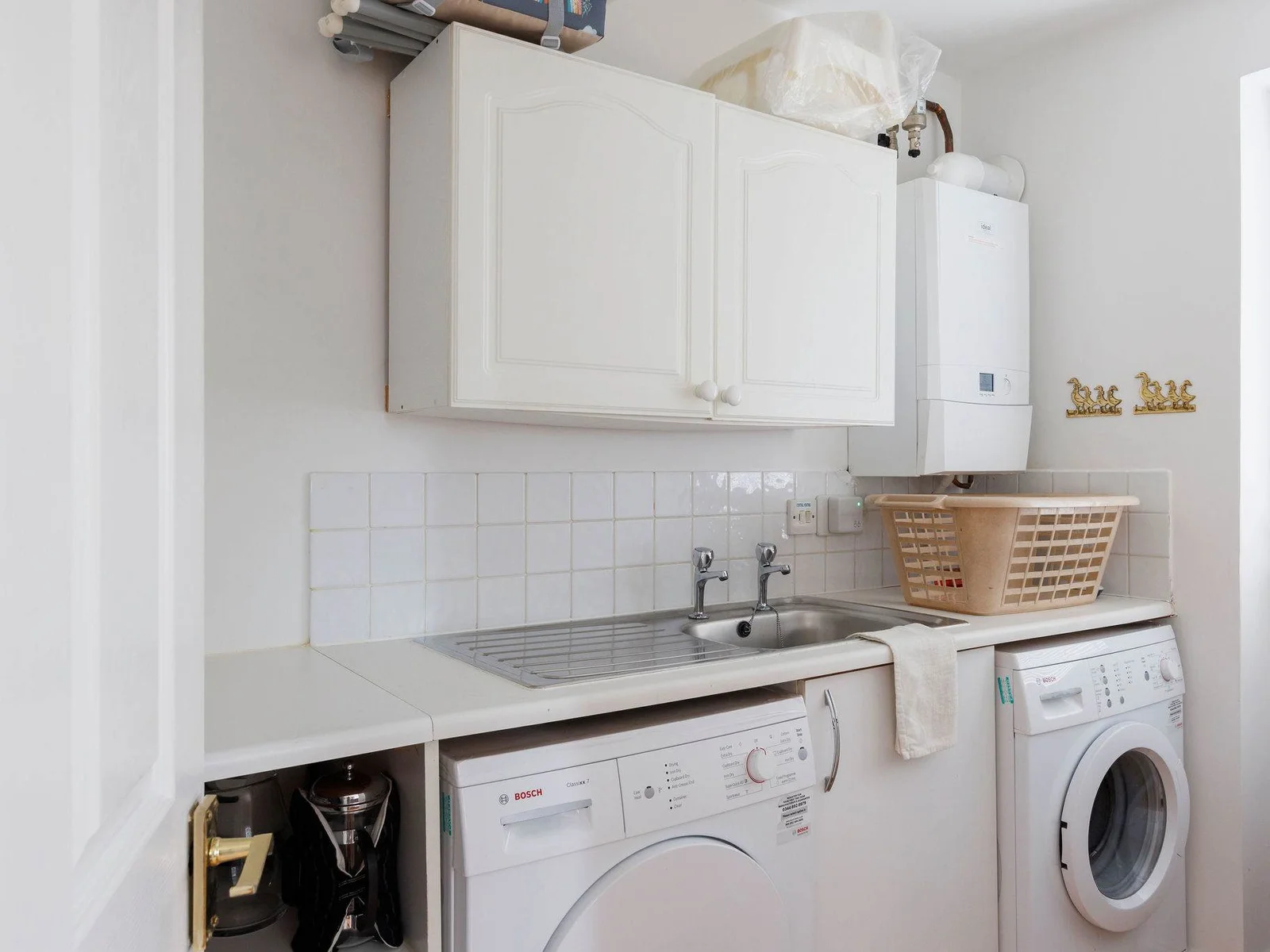 The separate utility room has everything you need to keep on top of holiday washing.