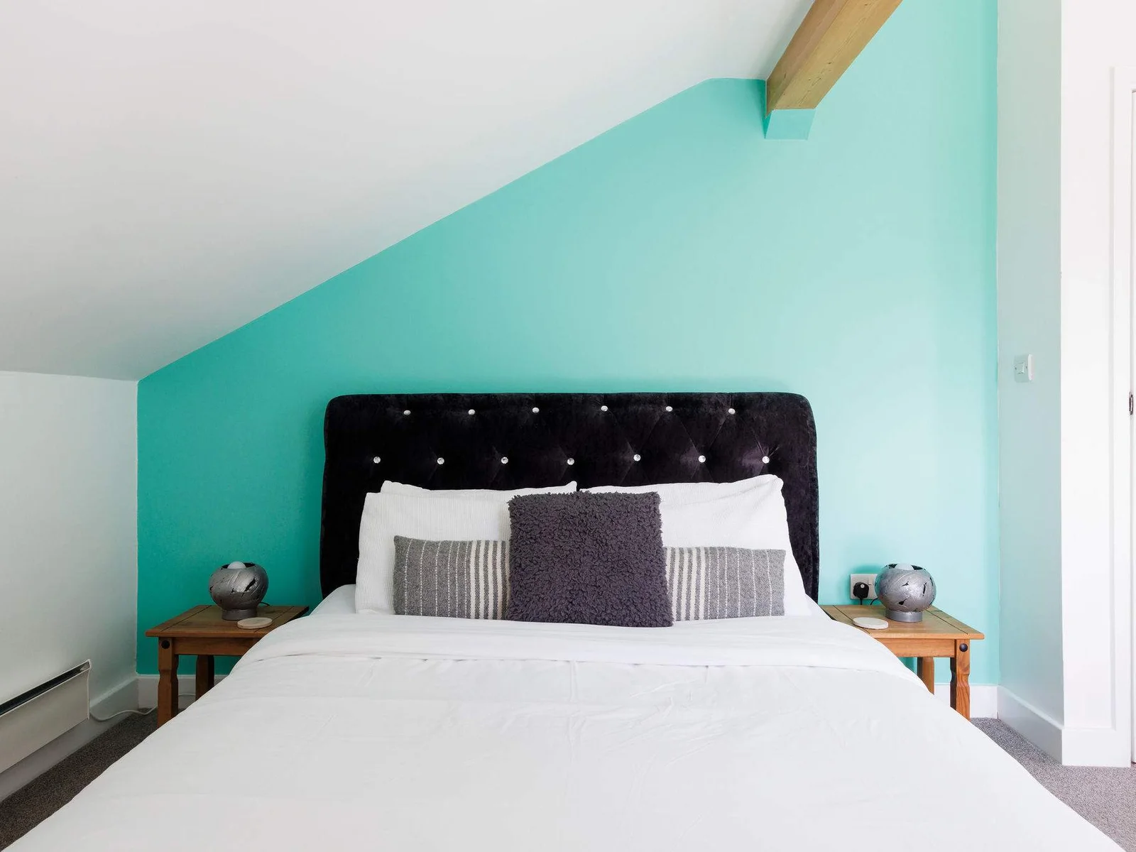 The master bedroom has a plush king bed, guaranteeing a great night's sleep.