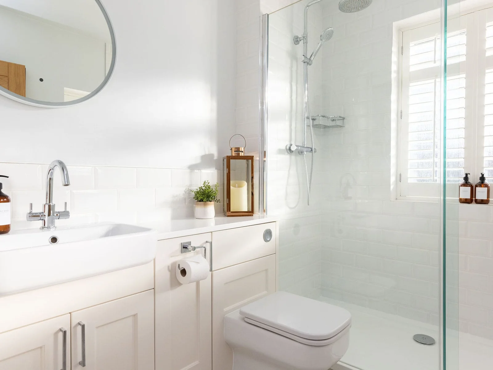 Sink, WC and overhead shower and bath can be found in the family bathroom