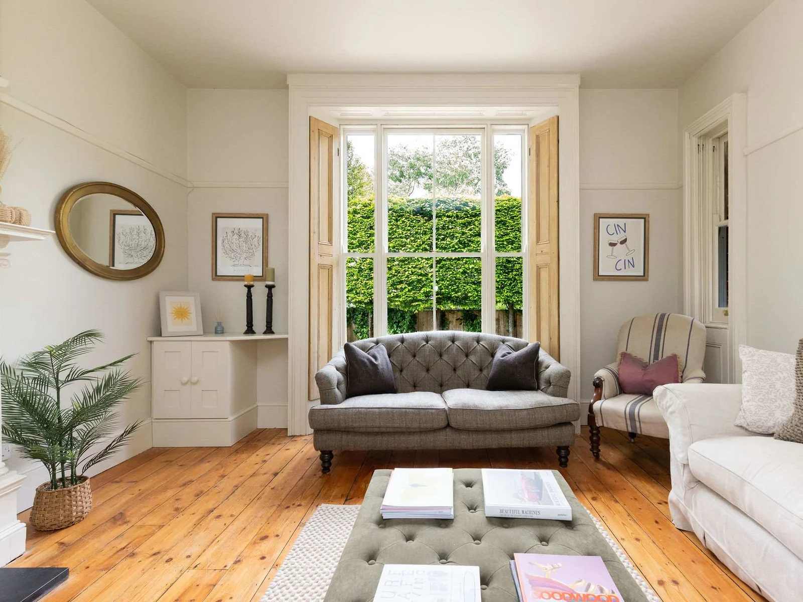 Elegant lounge space filled with natural light and comfort.