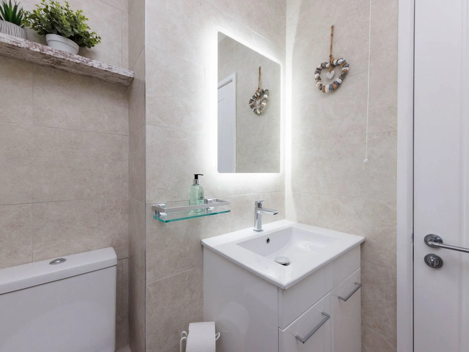 Freshen up after a day at the beach or exploring the local area, stocked with fresh towels and essential toiletries.