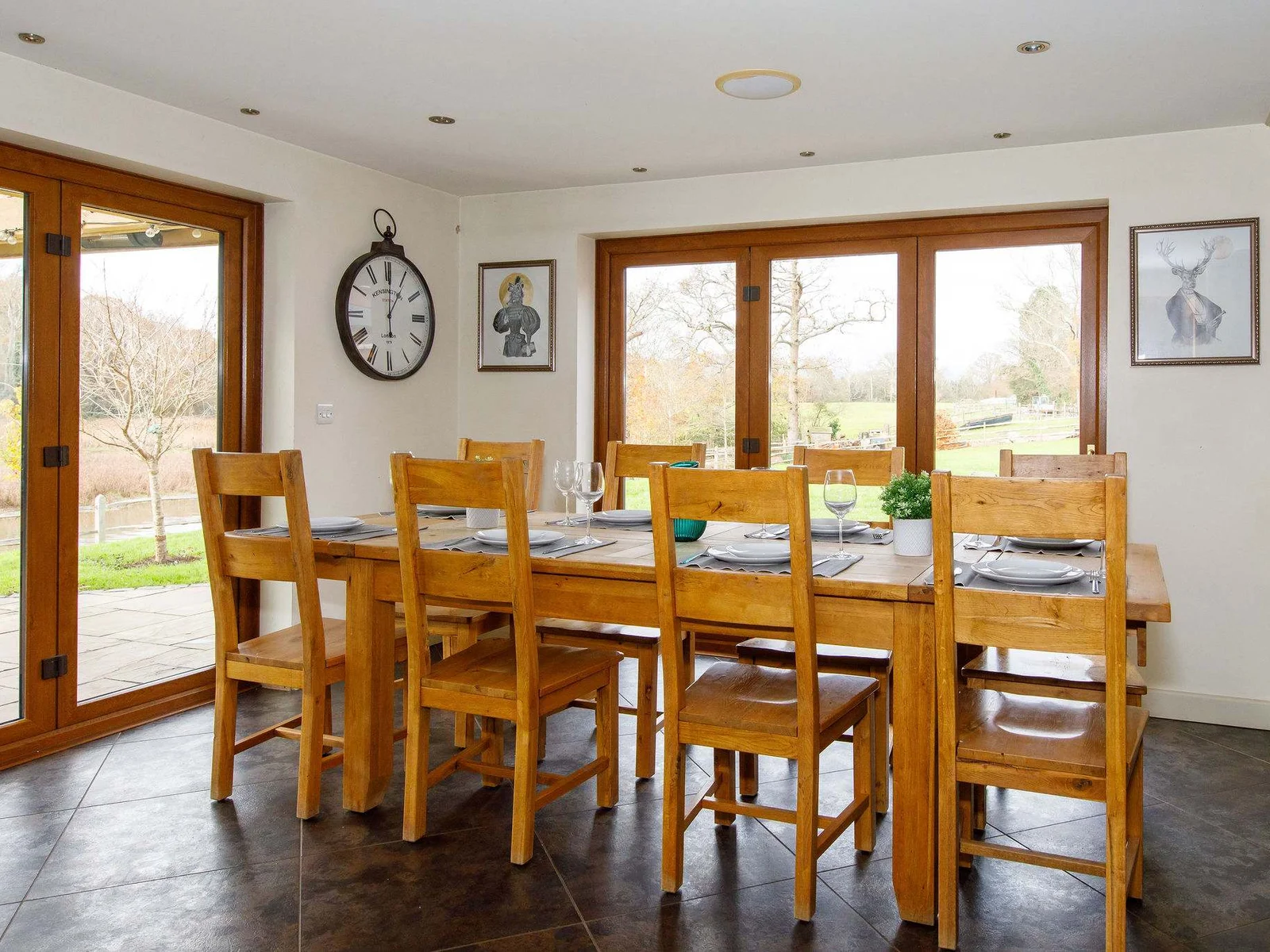The dining area has wonderful views across the gardens and beyond to the surrounding countryside and lake.