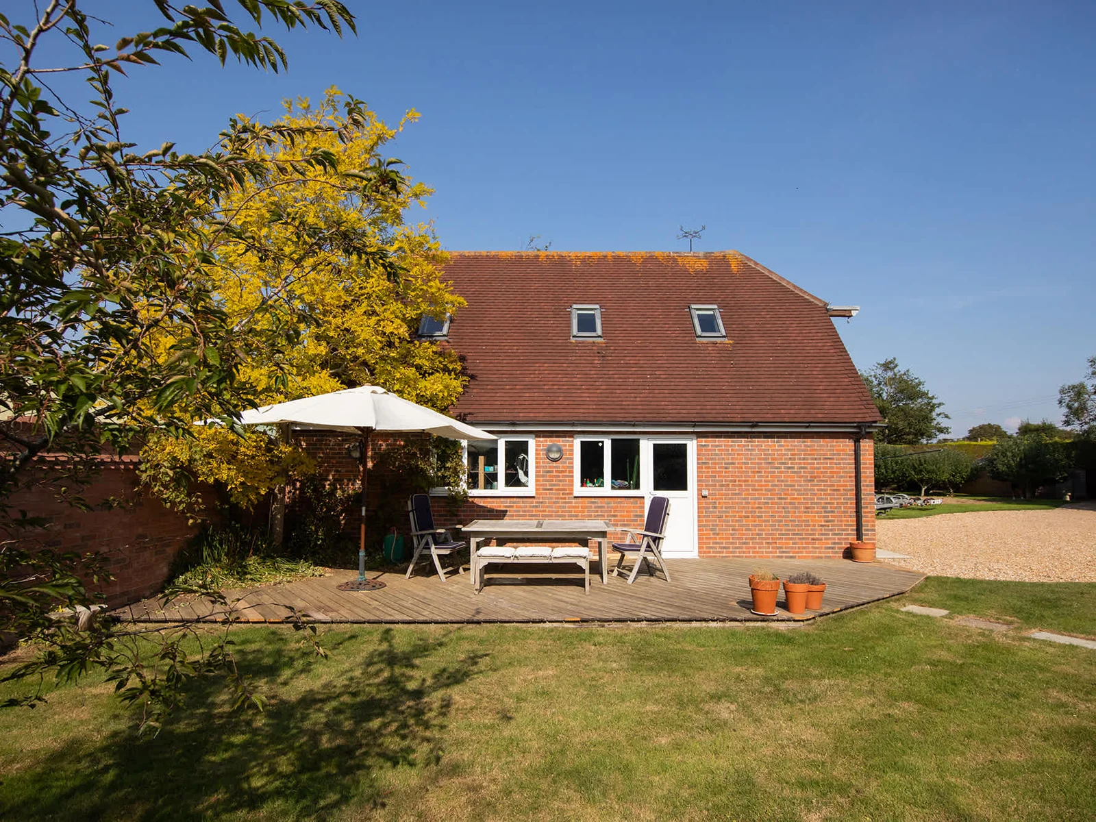 Enjoy the surrounding countryside, lawns and trees.