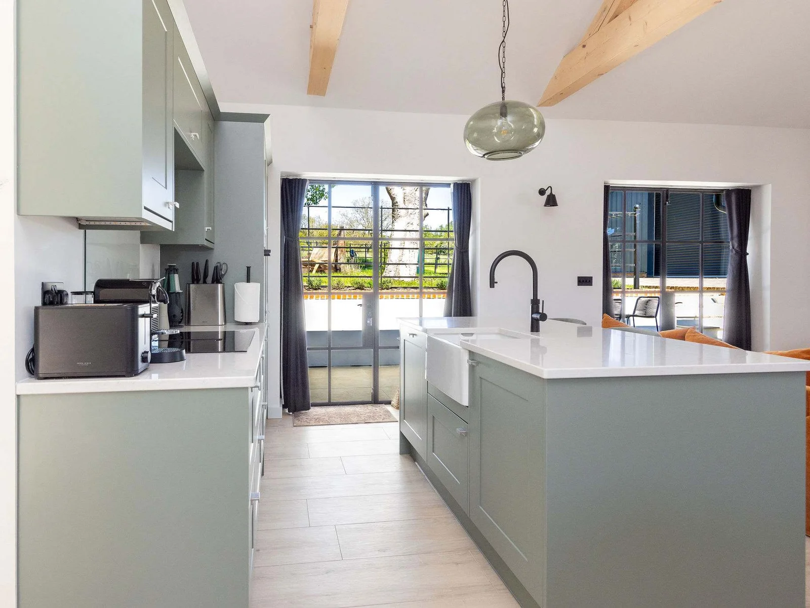 Enjoy a bright modern kitchen, ideal for slow breakfasts before exploring Chichester, Goodwood, and the coast.