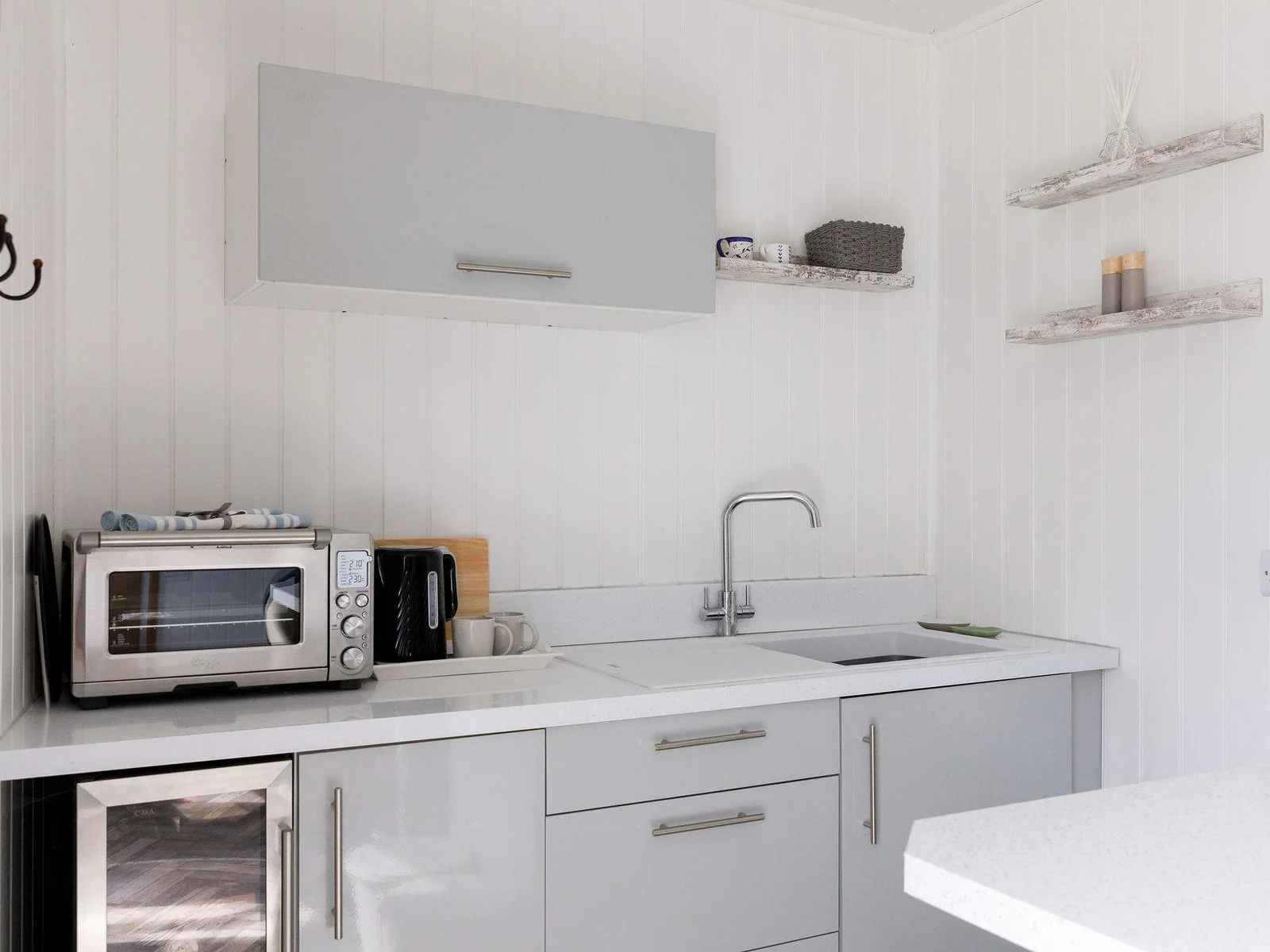 There is a small microwave oven for you to make all your meals and snacks, a mini fridge along with tea making facilities.