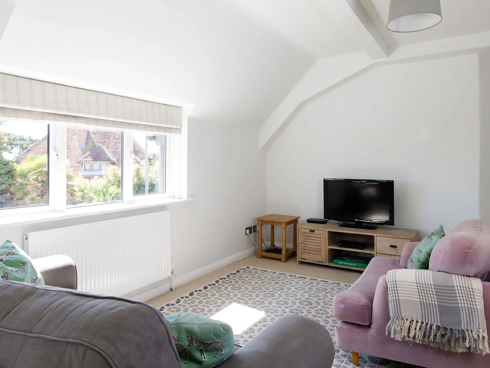 The upstairs lounge area is a lovely spot to read, talk or snooze!