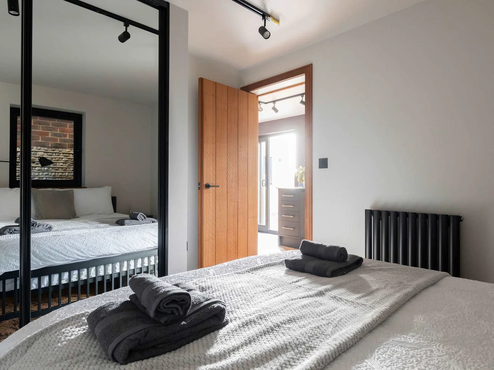 The master bedroom is conveniently located just off the kitchen.
