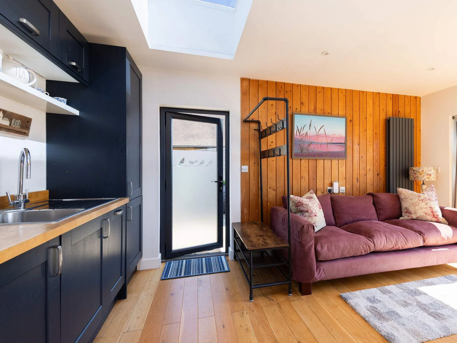 The lodge is inviting and cosy, with all the amenities of the barn - just on a smaller scale.