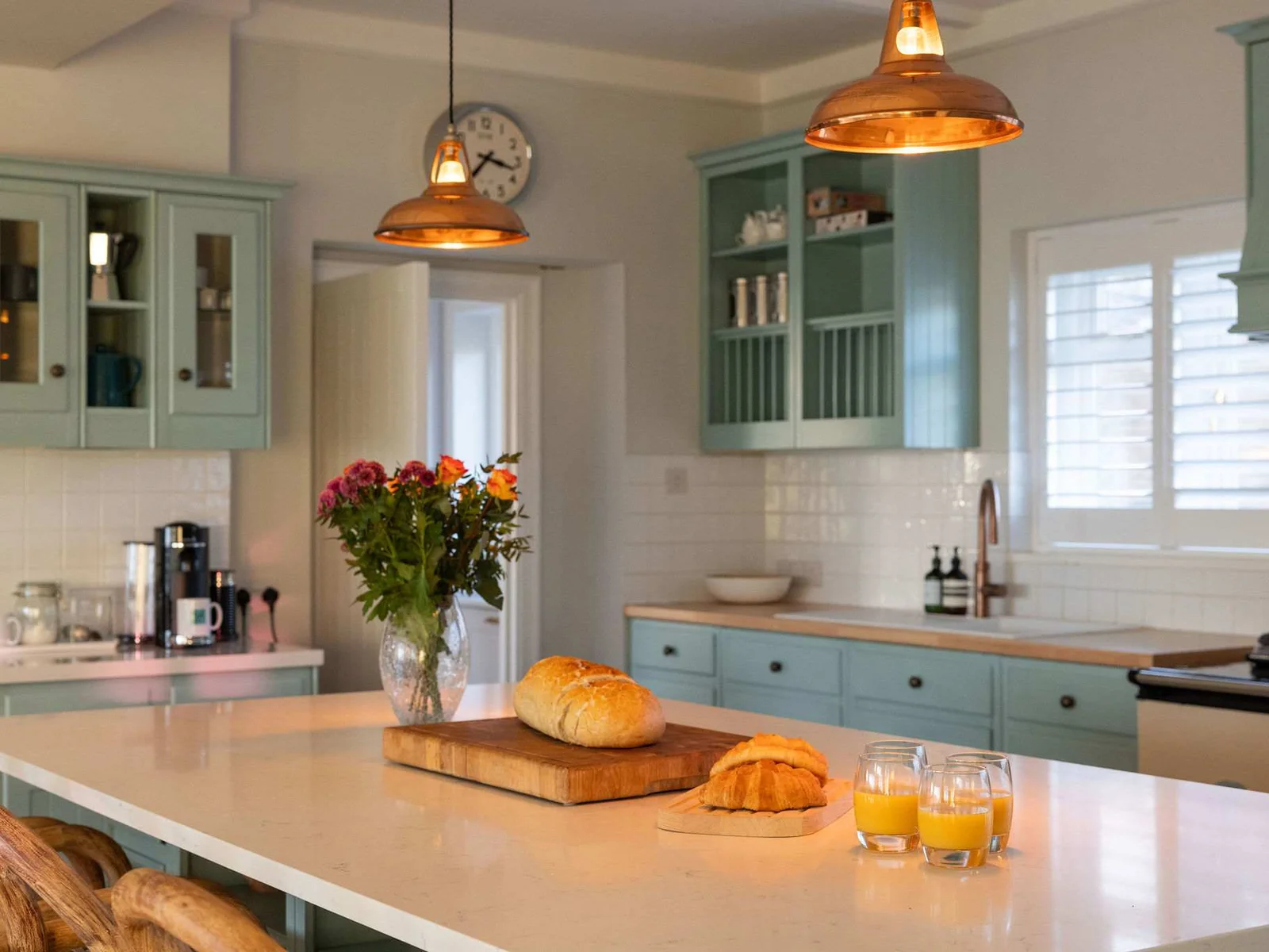 Modern kitchen with Nespresso coffee machine.