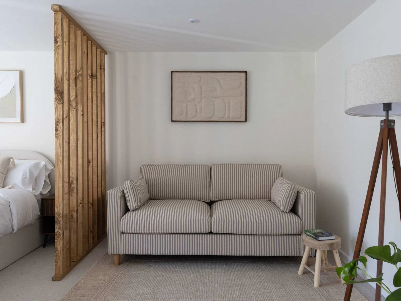 Comfortable seating area within the spacious bedroom, ideal for relaxing after a day exploring.
