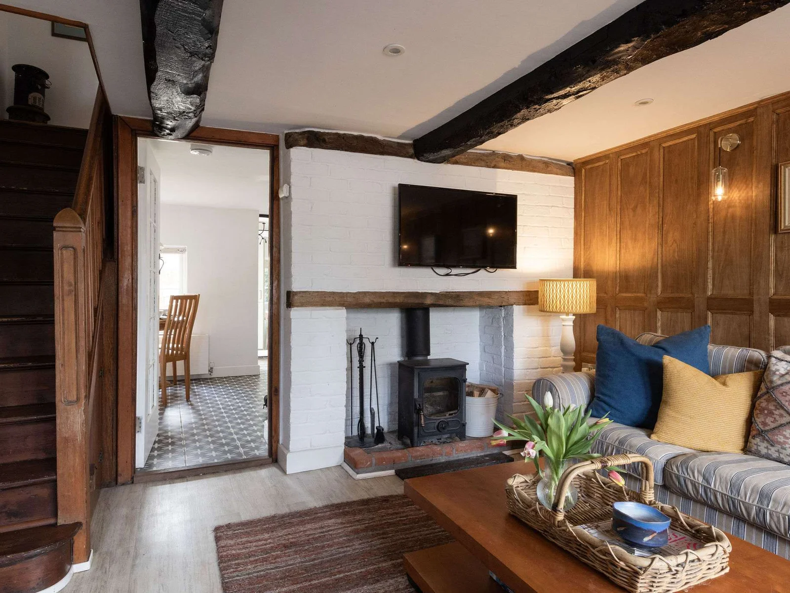 Cosy up by the log burner after a day by the sea