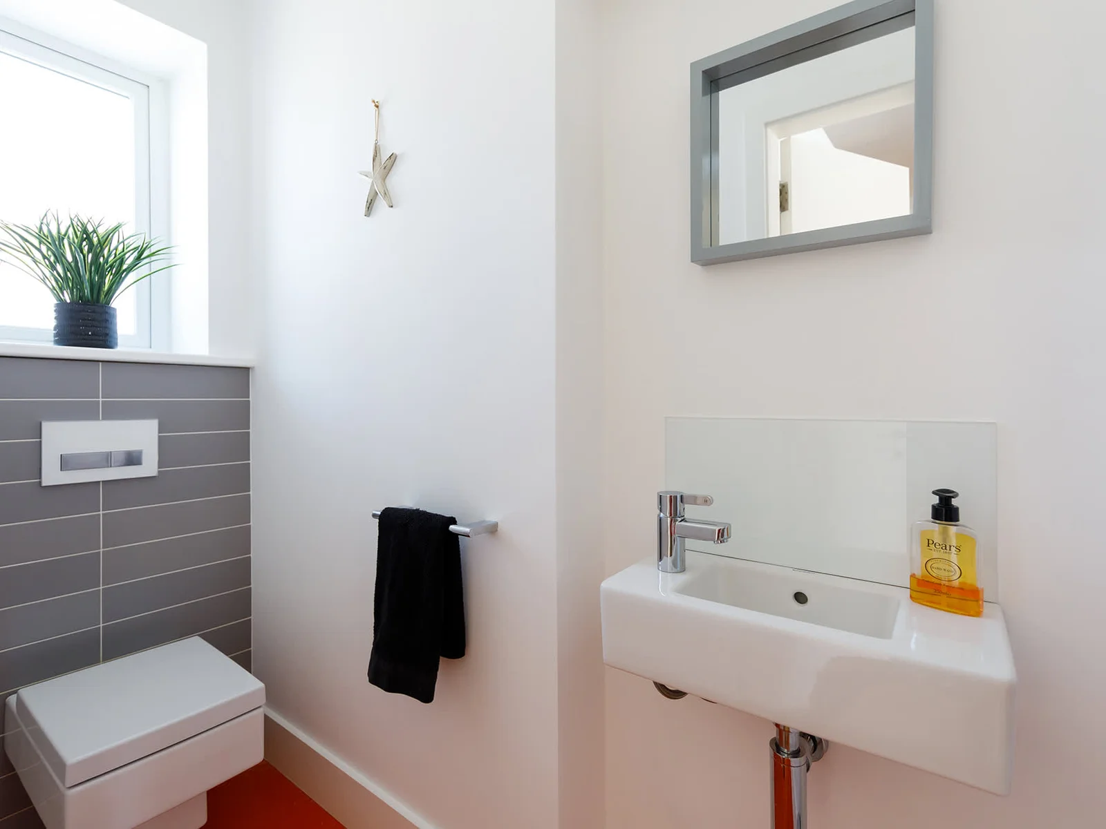 The downstairs bathroom, just across the hall from the downstairs shower room