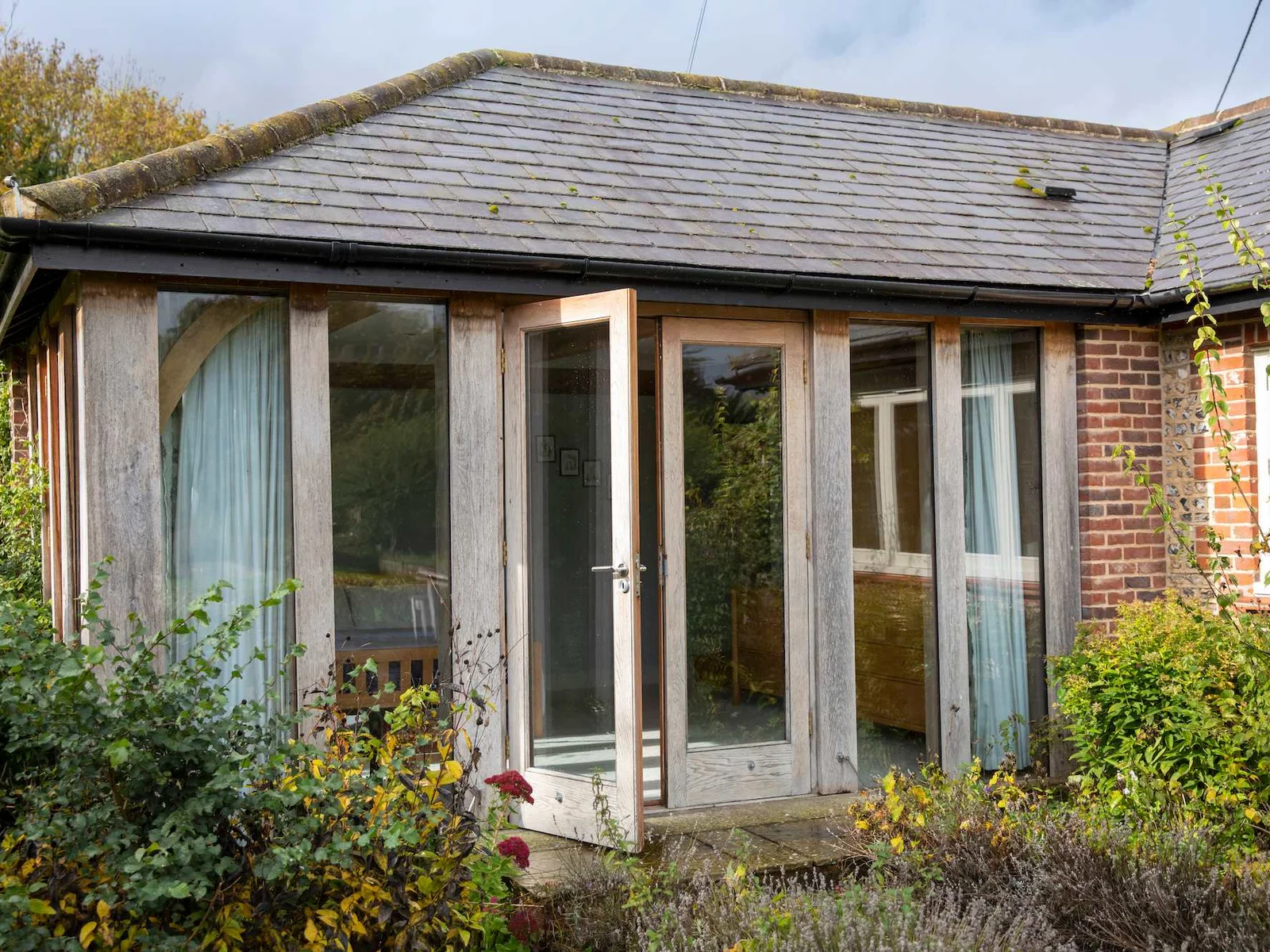The patio doors from the master bedroom onto the gardens