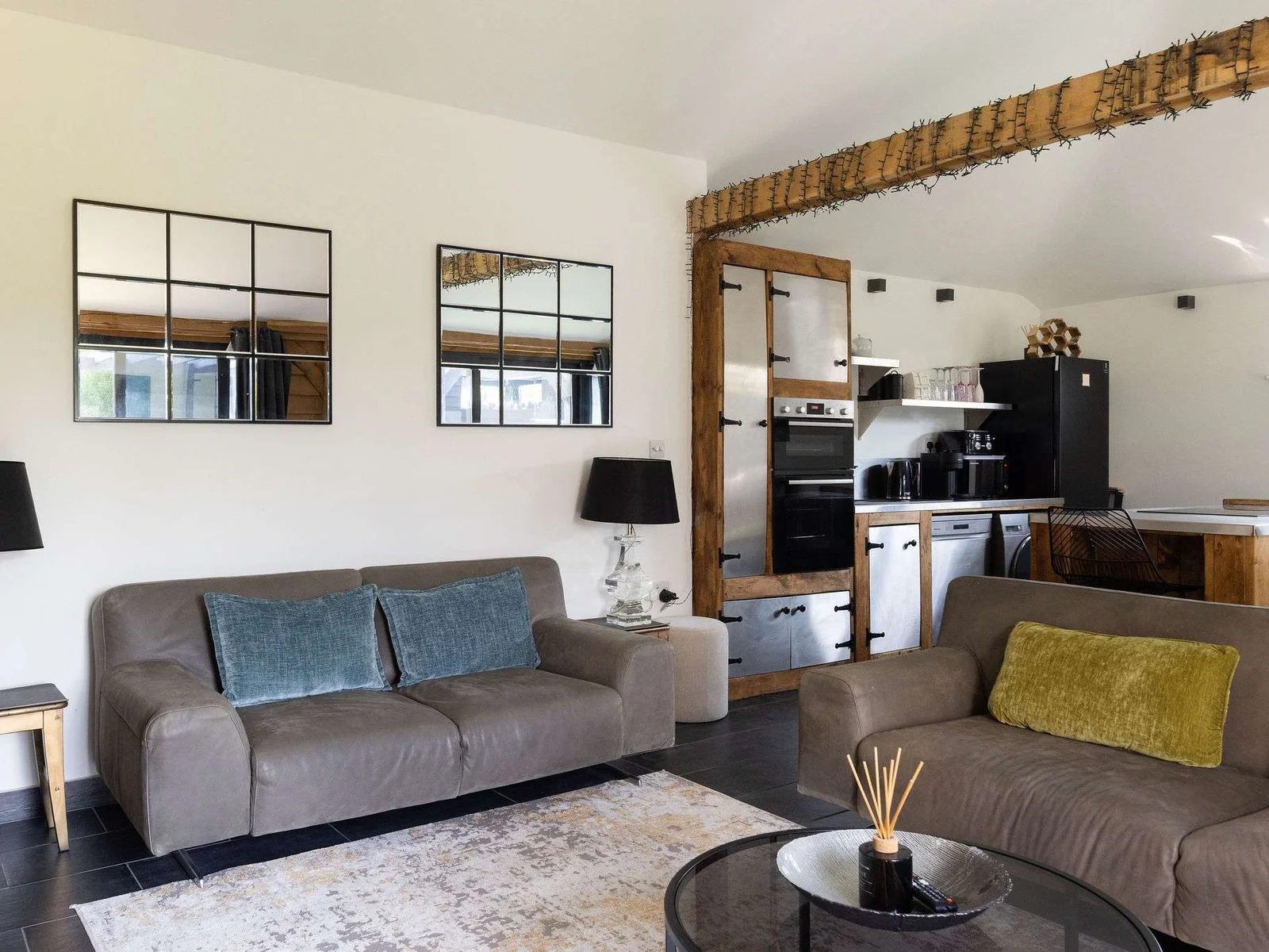 Relax in this spacious, stylish open-plan living area with unique modern-industrial design.