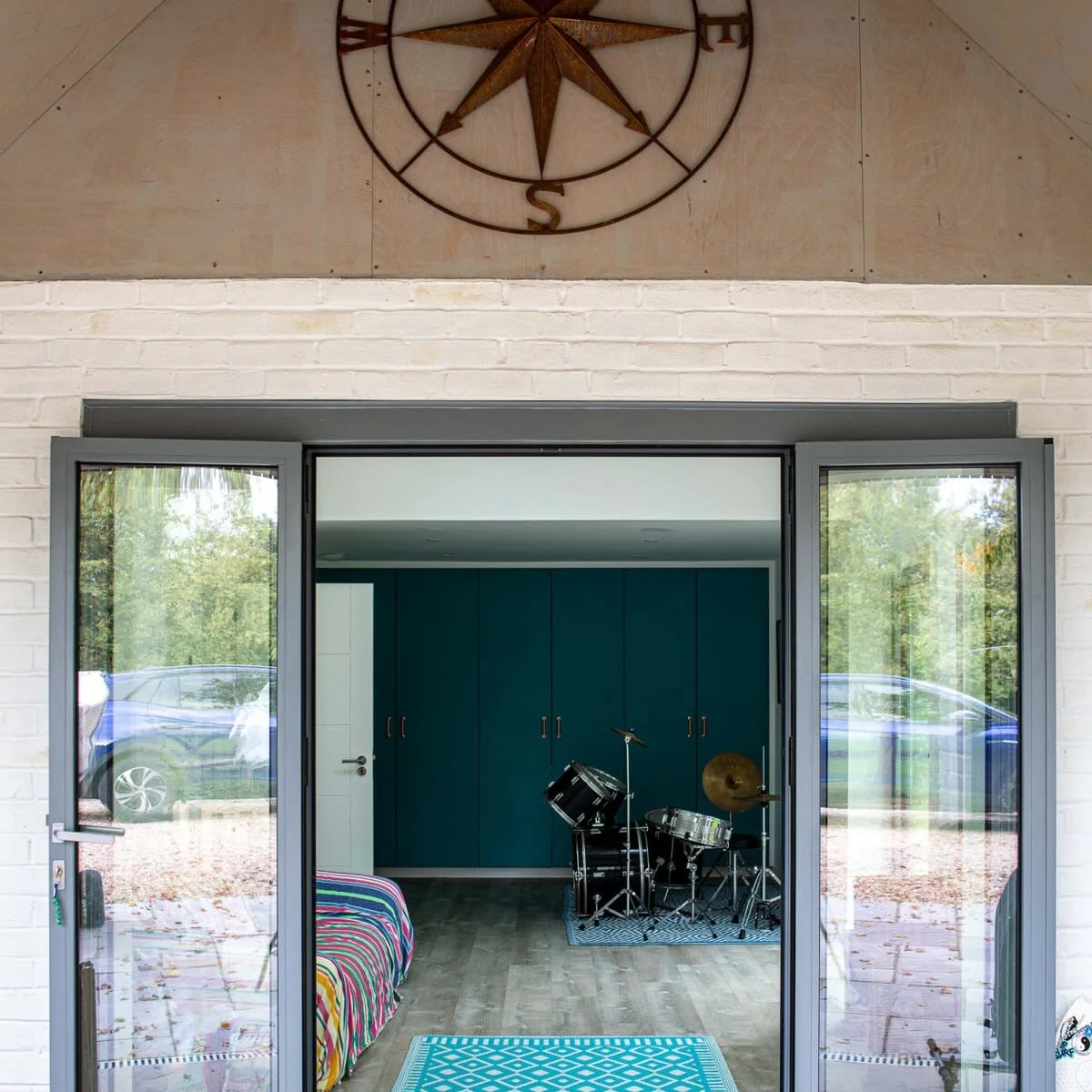 The side entrance into the games room, also gives access to the second garden and swimming pool