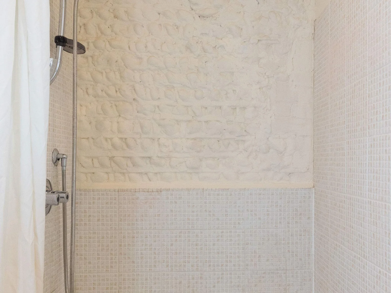 Ensuite to master in The Dairy with shower over tubby tub (short bath),
