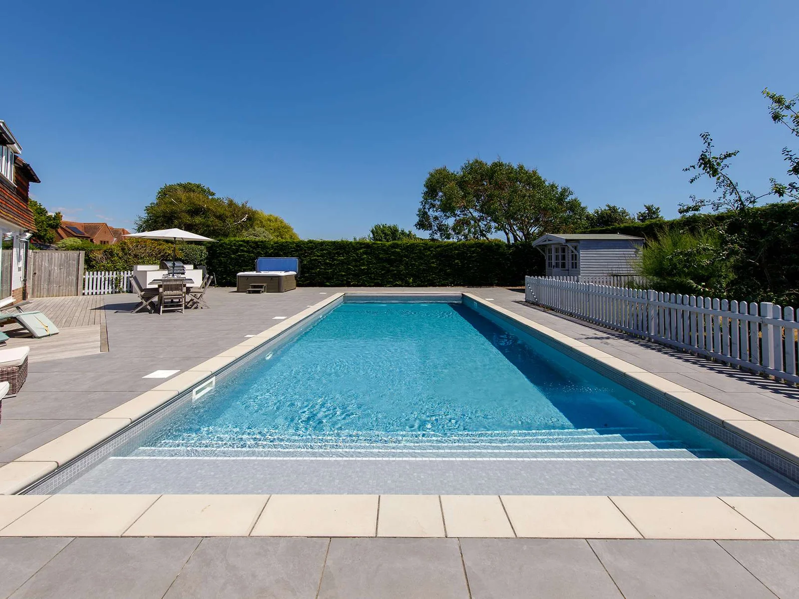 The inviting swimming pool is heated and open April to October.