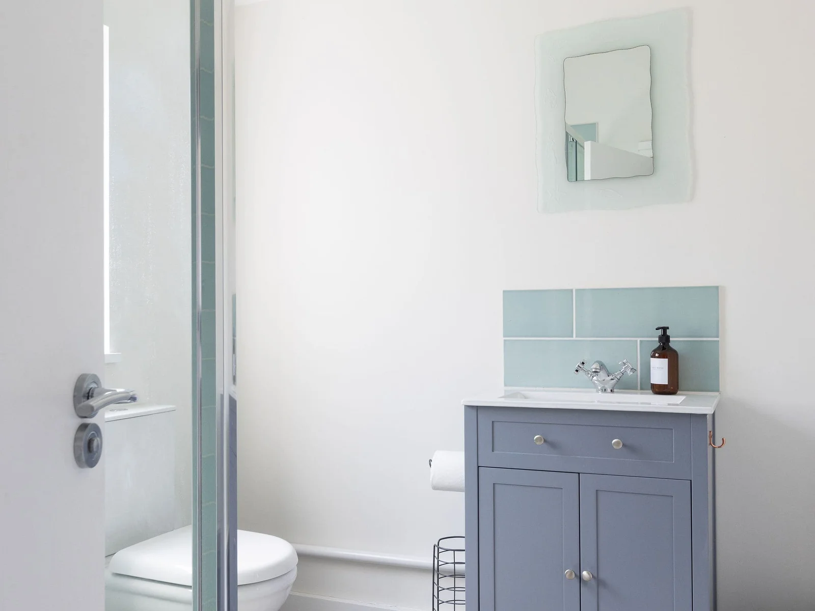 Modern bathroom with soft tones and light