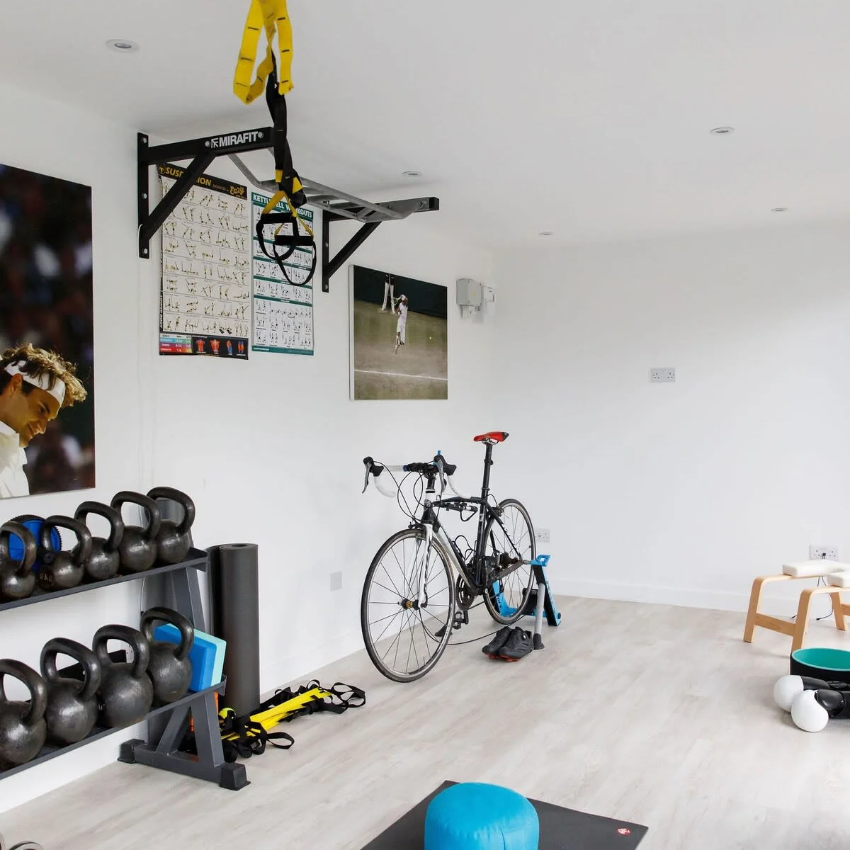 The house has a gym with weights, mats and other equipment.