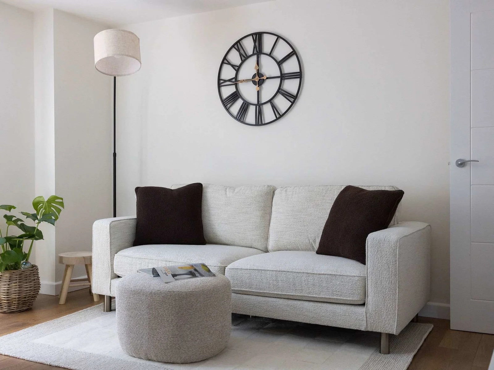 Cosy modern living area offering comfortable seating for a relaxing family getaway or city break.